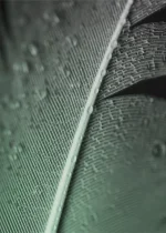 full frame water droplets grey feather surface
